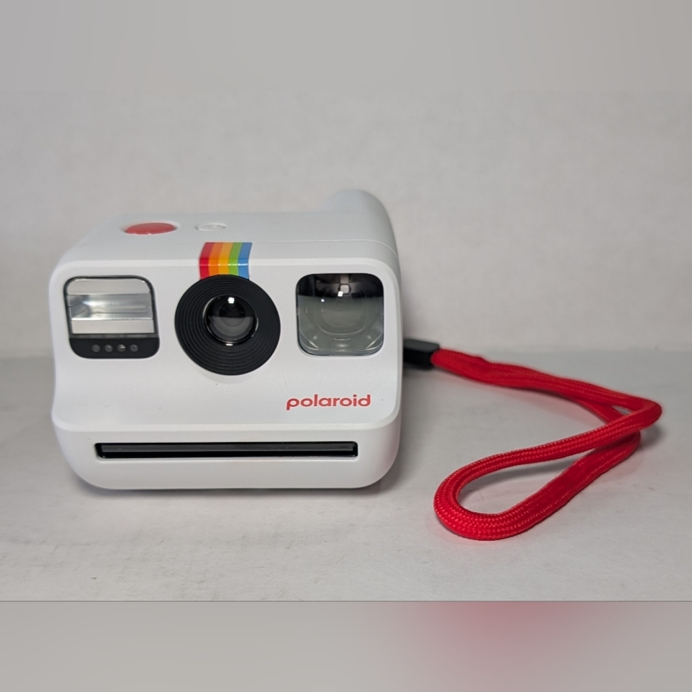 White Polaroid GO Instant Camera (Gen 2) with Case charger, and Cleaning Cloth